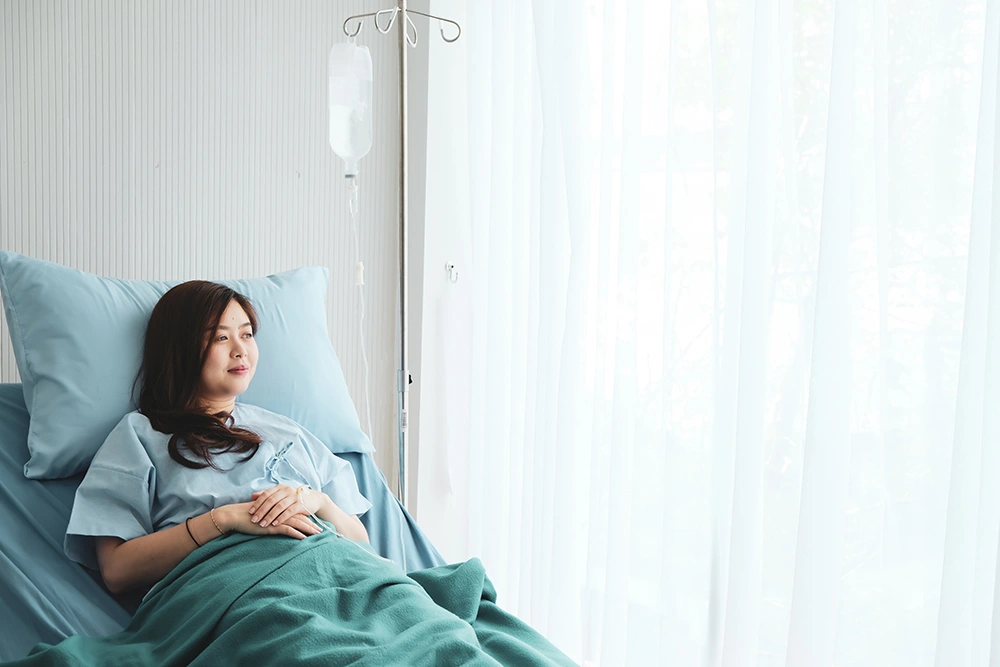 A specialist explaining breast cancer surgery options during a consultation