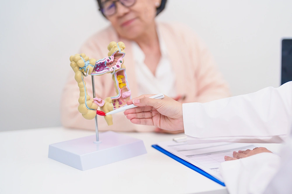 A colorectal cancer specialist discussing colorectal cancer care with a patient